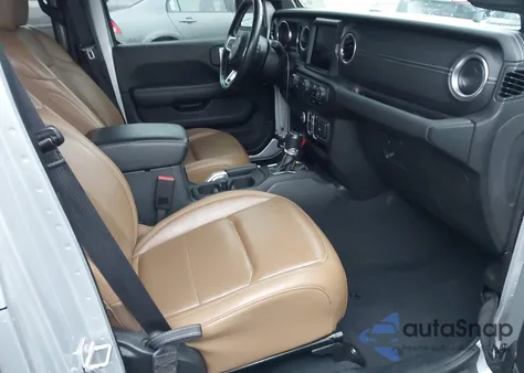 2022 Jeep Wrangler Unlimited Sahara 4X4 z USA, uszkodzony, nr VIN 1C4HJXEG6NW113227